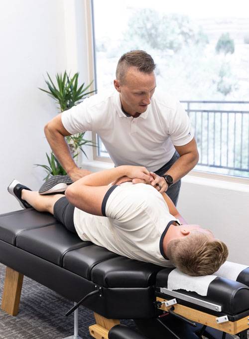 Chiropractor St George UT Scott Dodds Adjusting Patient